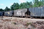Woochip hoppers on SM including ACL #84900 and SCL 195413